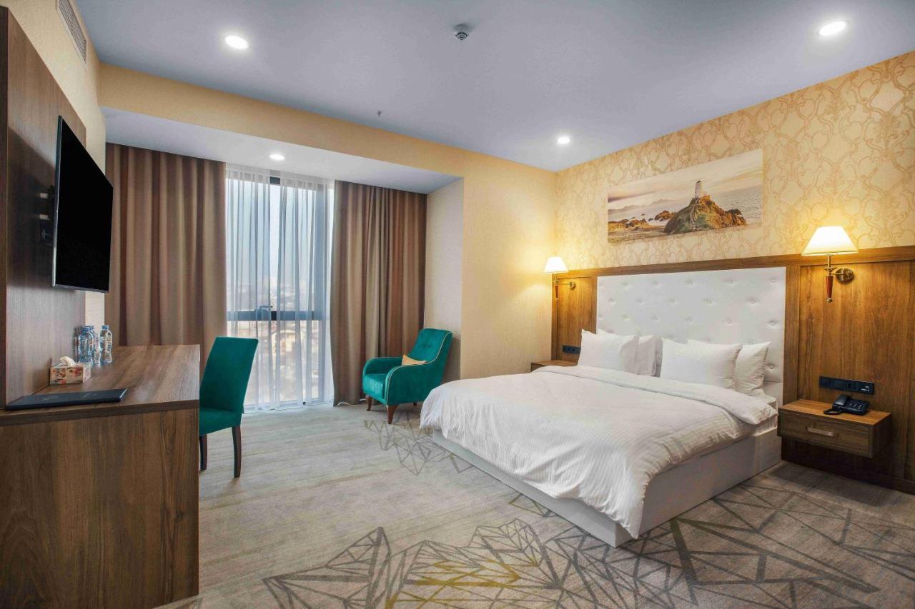Royal Tulip Hotel & Casino, Тбілісі Екстер'єр фото Deluxe room
